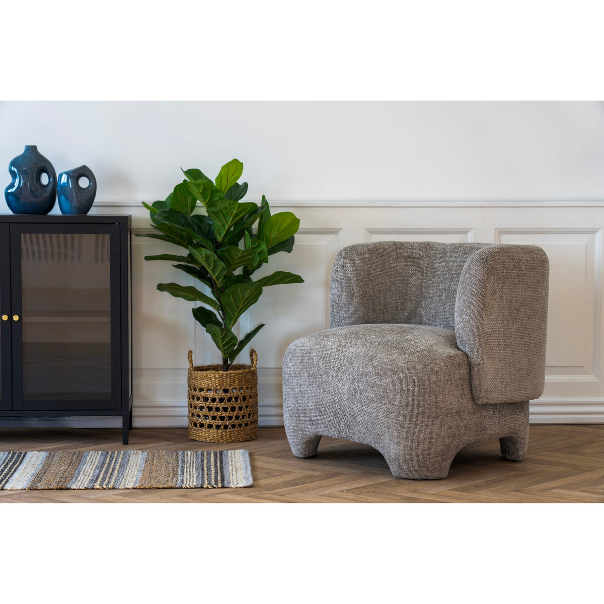 Nazare Loungestol i beige stof med sorte ben